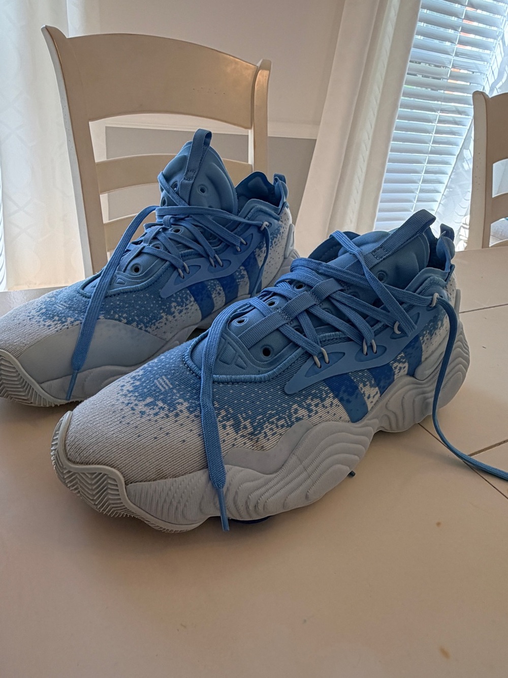 Adidas Trae Young 3 sneakers in the "Semi Blue Burst" colorway